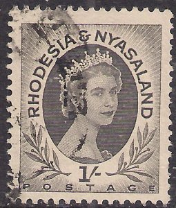 Rhodesia & Nyasaland 1954 - 56 QE2 1/-d Grey Black used SG 9 ( L567 )