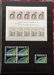 COLLECTION OF EUROPA STAMPS FR DIFFERENT COUNTRIES IN AN ALBUM PLUS ELVIS SHEET