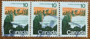 Canada #594 VF used strip of 3.