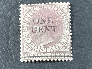 STRAITS SETTLEMENTS # 81--MINT/HINGED**(TONED GUM)** -SINGLE--VIOLET BROWN--1892