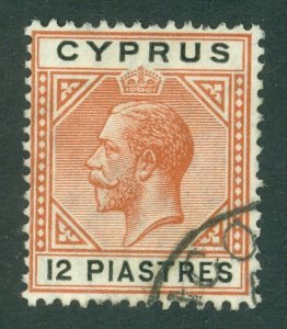 SG 82 Cyprus 1912-15. 12pi chestnut, part CDS, leaves Kings profile clear