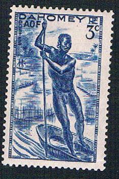 Dahomey 114 MLH Man poling canoe (BP0995)