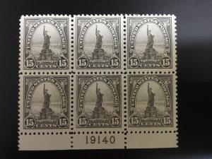 566 Plate Block Of 6.  Mint LH On The Upper Middle Stamp. Very Well Centered.