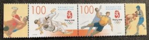 Kazakhstan 576 MNH souvenir sheet with tabs.