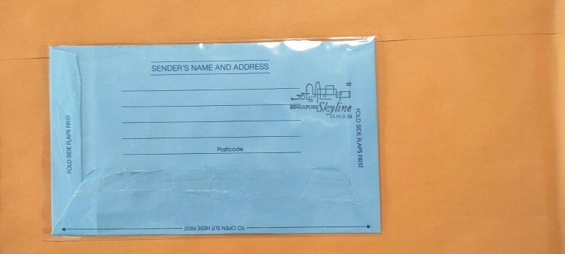 SINGAPORE  UNADDRESSED REGISTERED AEROGRAM TIED WITH SKYLINE STAMP SET