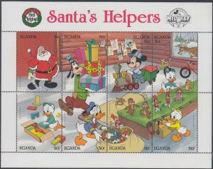 UGANDA Sc# 648 SHEET of 8 DIFF  STAMPS SHOWING all SANTA's 1988 XMAS HELPERS