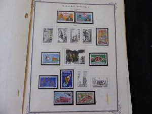 Malagasy Mostly MNH Stamp Collection on Scott Spec Album Pages