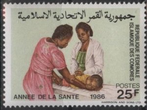 Comoro Islands 628 (mnh) 25fr Health Year: pediatric examination (1986)