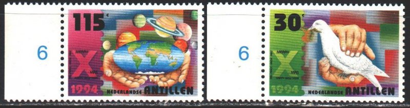 Antilles. 1994. 822-23. Christmas, New Year, dove, hands, planets. MNH.