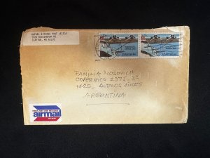 C) 1987. UNITED STATES. AIR MAIL ENVELOPE SENT FROM ARGENTINA DOUBLE STAMPED