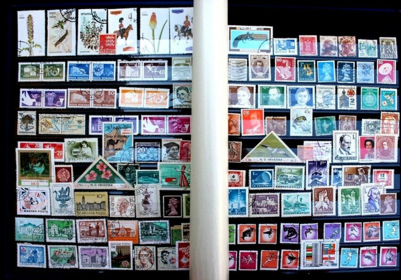 Wordwide Stamp Collection Lot of 1000 MNH, MH & Used Lighthouse Stock Book