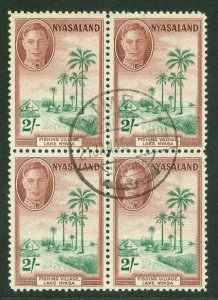 SG 153 Nyasaland 1945. 2/- emerald & maroon. Very fine used block of 4