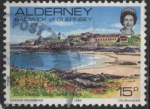 Alderney 9 (used) 15p view of Corblets Bay Port (1983)