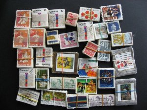 Canada wholesale bundles regular, under 100 estimate 1500 better stamps used
