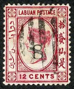 LABUAN SG11x 1880 8 on 12c. carmine (value obliterated by manuscript bar in red)