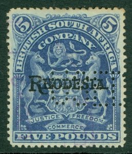 SG 113e Rhodesia 1909. £5 deep blue. Perfin. Fiscal used