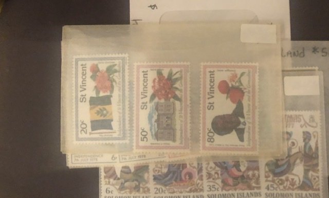 Lot of International Stamps In Glass Scenes Some Have Nice Value