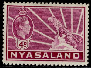 NYASALAND PROTECTORATE GVI SG135, 4d bright magenta, M MINT.