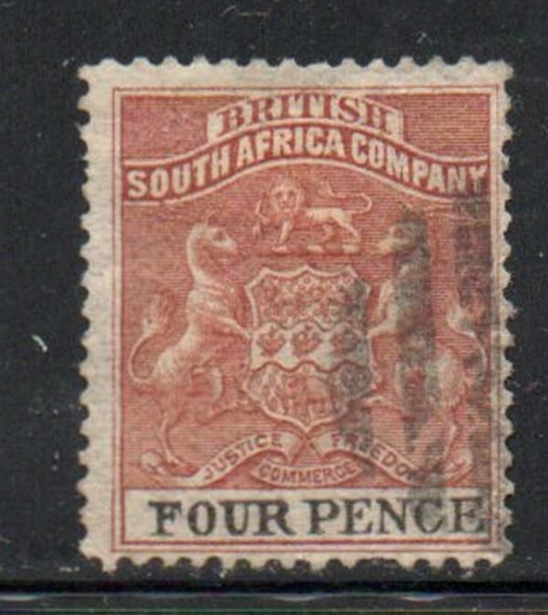 Rhodesia Sc 5 1890 4 d red brown & black Coat of Arms stamp used
