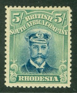 SG 321 Rhodesia 5/- deep blue & bright green. A fine lightly mounted mint...