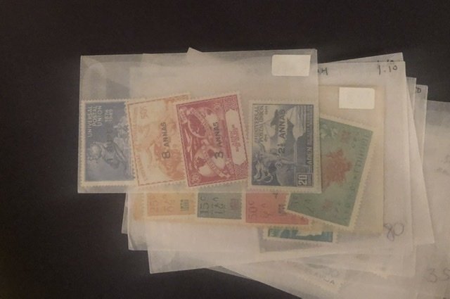 Lot of International Stamps In Glass Scenes Some Have Nice Value