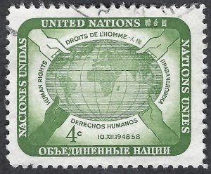 United Nations #67 4¢ Human Rights -  Hands Upholding Globe (1958). Used.