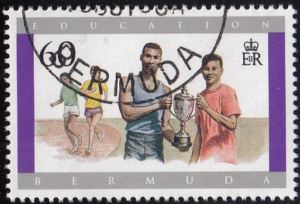 Bermuda 1997 used Sc #749 60c Boys with sports trophy Education