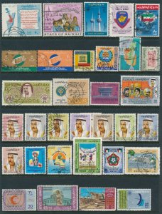 Kuwait collection mostly on Scott pages. Mint hinged, MUH and Used. High Value 