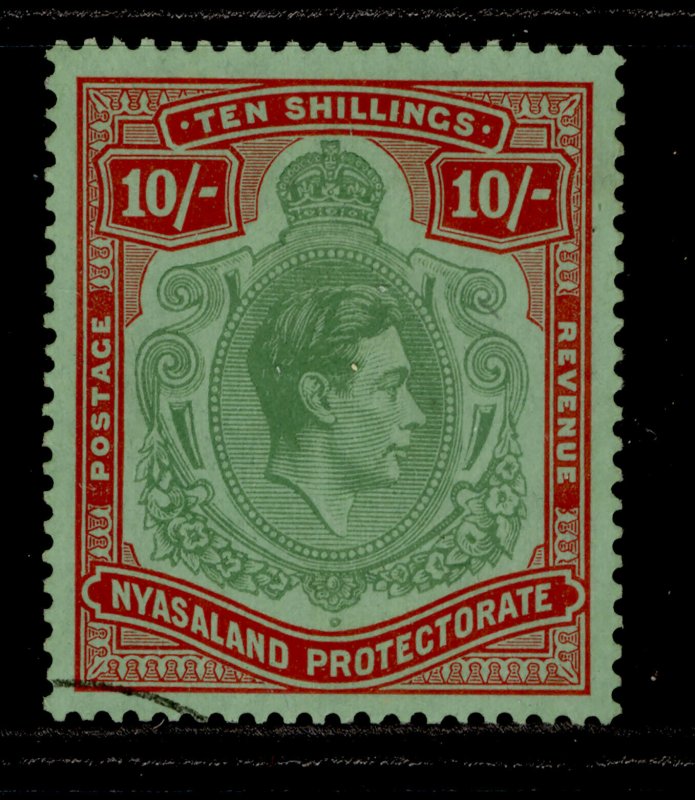 NYASALAND PROTECTORATE GV SG96, 10s pale green/deep scarlet FINE USED. Cat £160.