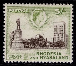 RHODESIA & NYASALAND QEII SG29, 5s dp chocolate & yellow-green LH MINT. Cat £16.