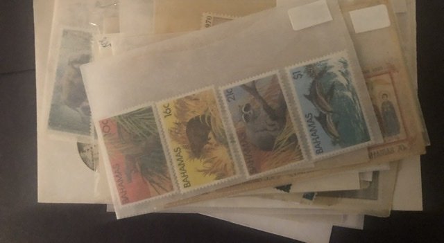 Lot of International Stamps In Glass Scenes Some Have Nice Value