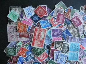 Great Britain 600 perfins QEII era mixture (duplicates, mixed condition)