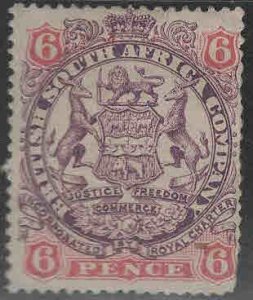 Rhodesia Scott 55 MH* coat of arms stamp hinge remnant in gum