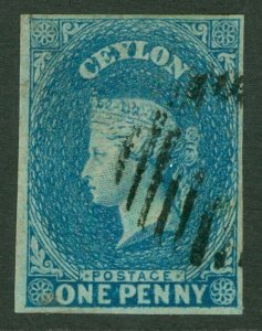 SG 2b Ceylon 1857-59. 1d blue on blued paper. Very fine used. 4 margins CAT £225