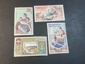 LAOS # 48-51--MINT/NEVER HINGED---COMPLETE SET---1958