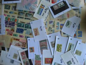 WW boxlot stamps in glassines,sales cards,stock pages,what lurks? Check them out