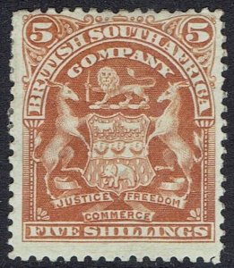 RHODESIA 1898 ARMS 5/-