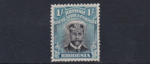 RHODESIA  1913 - 19  S G 232  1/-   BLACK &  GREENISH BLUE       MH 