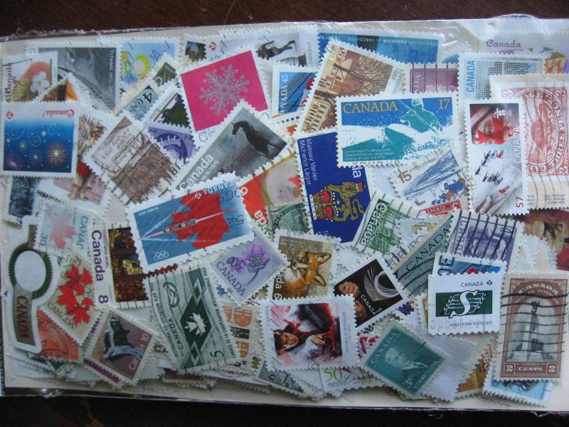 CANADA colossal mixture(duplicates,mixed cond)10,000 old,new,35%comems,65%defins