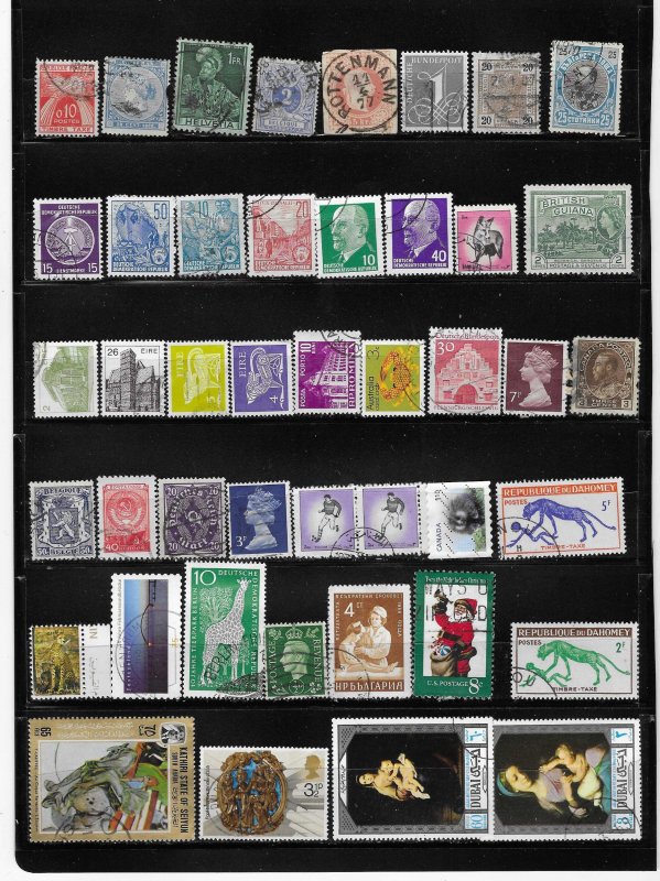 World Wide Collection of 43 Different Old Used Off Paper Stamps