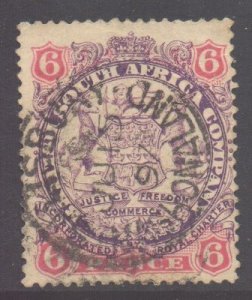 Rhodesia Scott 31 - SG33, 1896 Arms 6d Plate 1/2 used