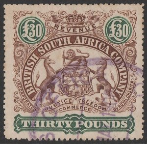 RHODESIA 1897 Arms Revenue £30 brown & green, perf 15.