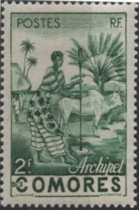 Comoro Islands 33 (mnh) 2fr woman grinding grain, brt grn (1950)