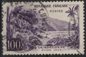 France 909 (used) 100fr Sens River, Guadeloupe, dp vio (1959)