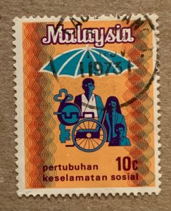 Malaysia 1973 10c Social Security,  used. Scott 98, CV $0.25. SG 100