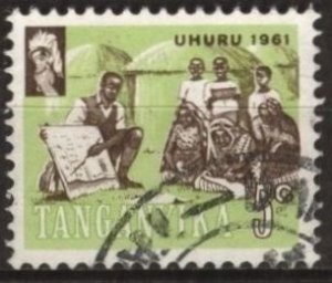 Tanganyika 45 (used) 5c teacher, villagers, sepia & yel grn (1961)