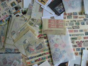 WW boxlot stamps in glassines,sales cards,stock pages,what lurks? Check them out