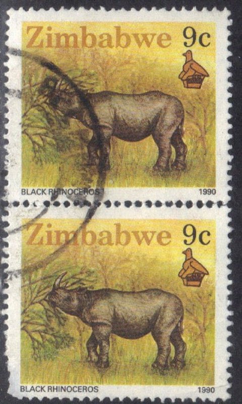 ZIMBABWE  SC# 619 **USED** 9c 1990  BLACK RINO  PAIR  SEE SCAN