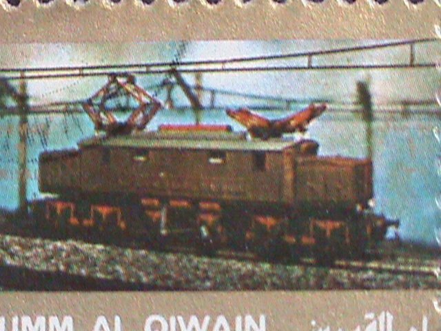 ​UMM AL QIWAIN-1973 WORLD FAMOUS TRAINS CTO MINI SHEET VERY FINE
