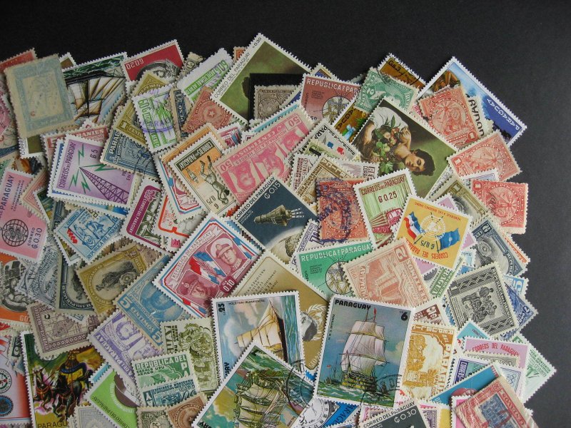 Paraguay scrap pile (duplicates, mixed cond) estimate 350 stamps